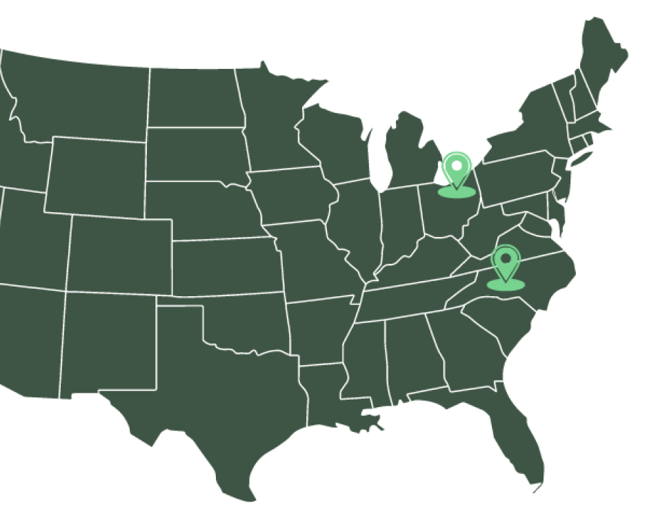 Dark green map of the United States, with a location icon on both of the Extera locations in Middlefield, OH and Statesville, NC.