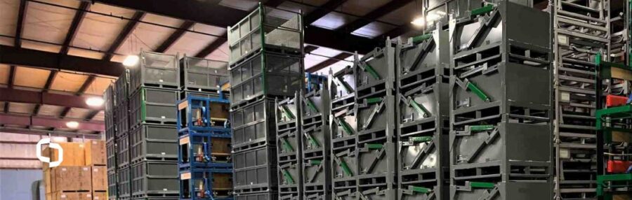 Stacked metal containers demonstrating their durability and efficiency for industrial and commercial applications.